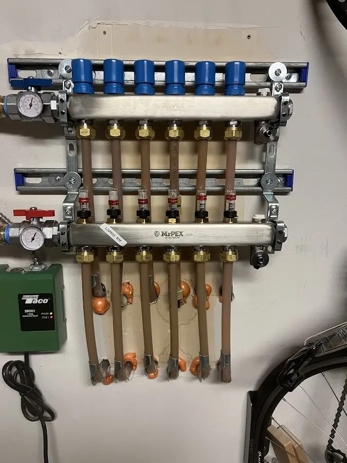 Plumber performing Water Heater Repair at a residential property in Clifton Forge